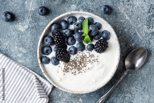 Greek yogurt Bowl topped with berries and chia seeds, healthy diet food