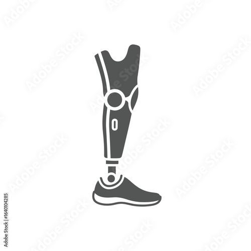 A dark grey icon of a modern prosthetic leg with a mechanical knee joint and a foot wearing a sneaker.