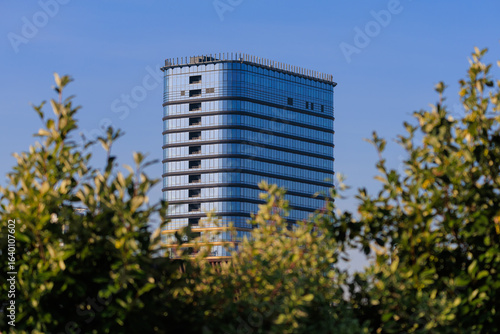 Canvas Print City view, modern buildings and skyscrapers against the blue sky.