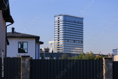 Canvas Print Cityscape on a sunny day, modern buildings and houses