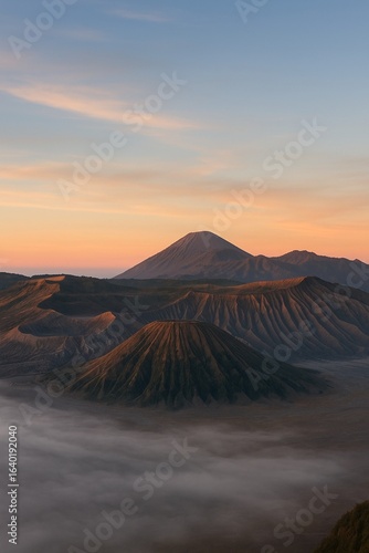 Mount Bromo Sunrise with Golden Light and Misty Valley, East Java Indonesia