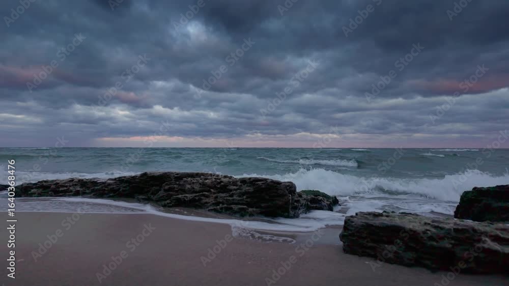 Rocky sea shore at sunset storm Rocky sea shore at sunset storm