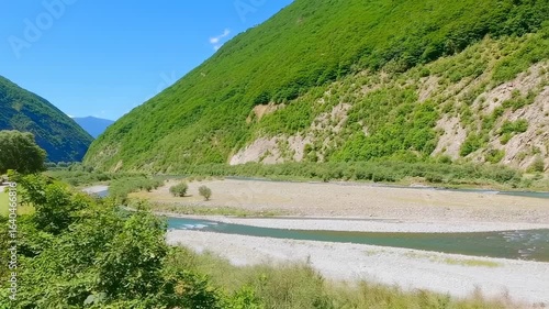 Braided River Carving Through Lush Valley in the Georgian Highlands