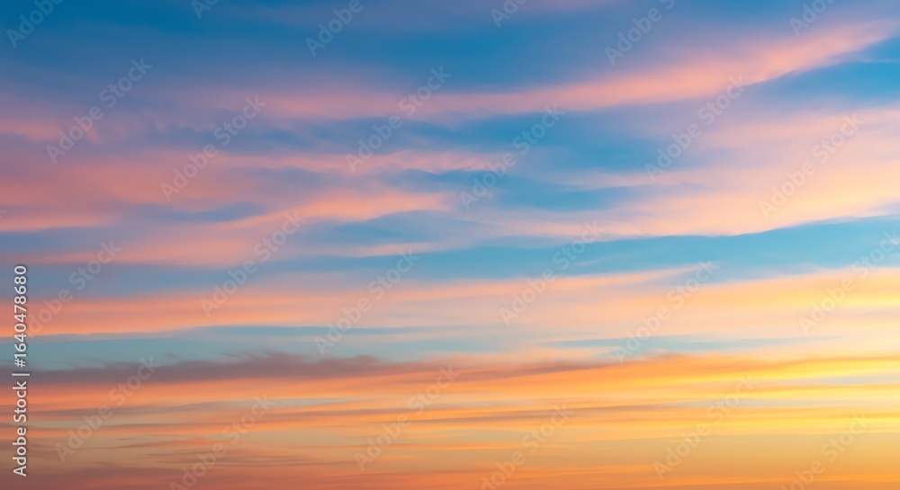 Fototapeta premium Colorful Sunset Sky with Pink Orange Blue Clouds Over Horizon