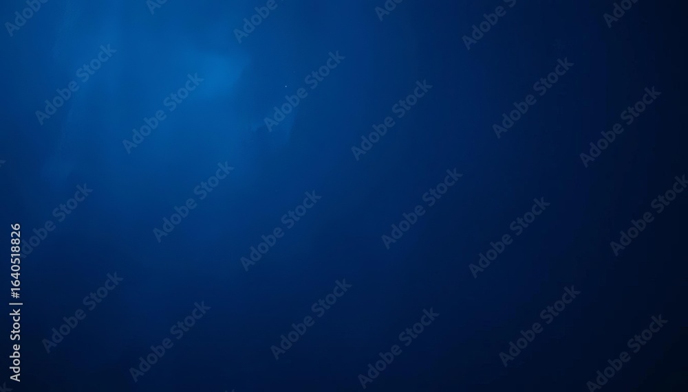 Obraz premium Deep indigo, subtly textured backdrop with mottled shading and organic, almost cosmic feel, art, space