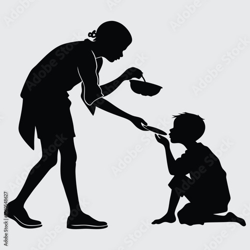 Silhouette of Woman Feeding a Hungry Boy – Charity and Compassion Concept