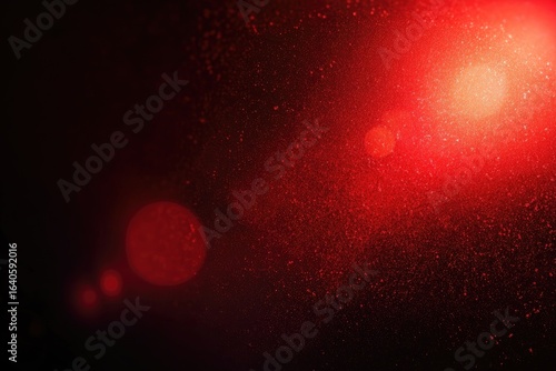 Abstract red light flare on dark background