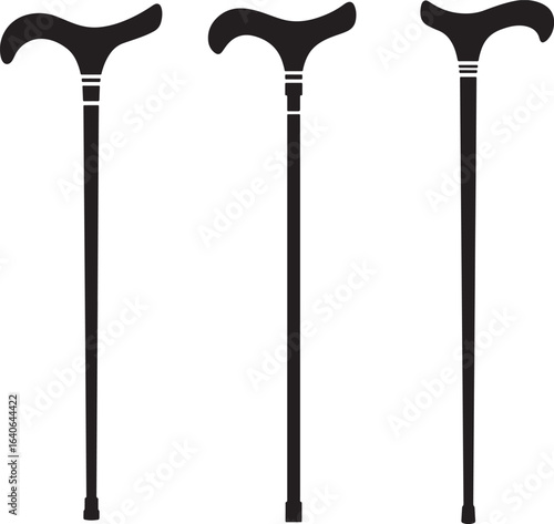 Three classic walking canes in a row silhouette