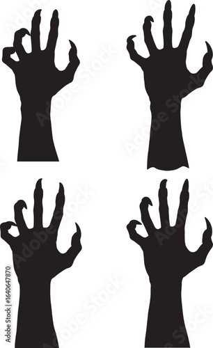 Four spooky monster claw hands reaching up silhouette