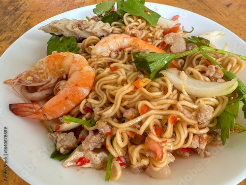Thai spicy salad with mama noodles, Vietnamese sausage, minced pork and shrimps