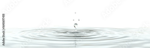 Single water droplet creating ripple
