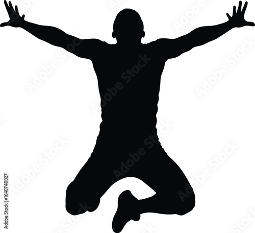 Silhouette of an Exuberant Person Jumping with Arms Raised and Legs Bent