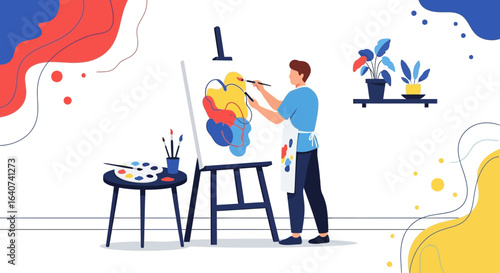 Creative artist painting abstract artwork in studio using easel and vibrant colors
