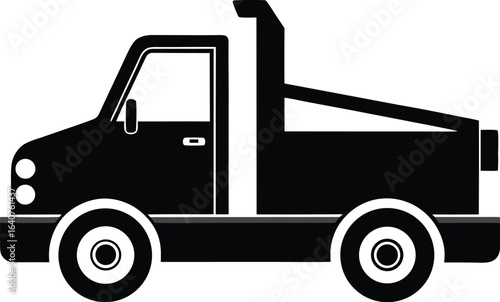 Silhouette of a tow truck from the side