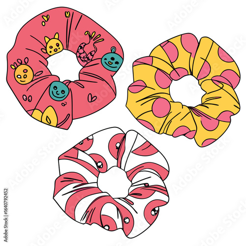 Colorful set of handmade cartoon scrunchies with cute designs and patterns