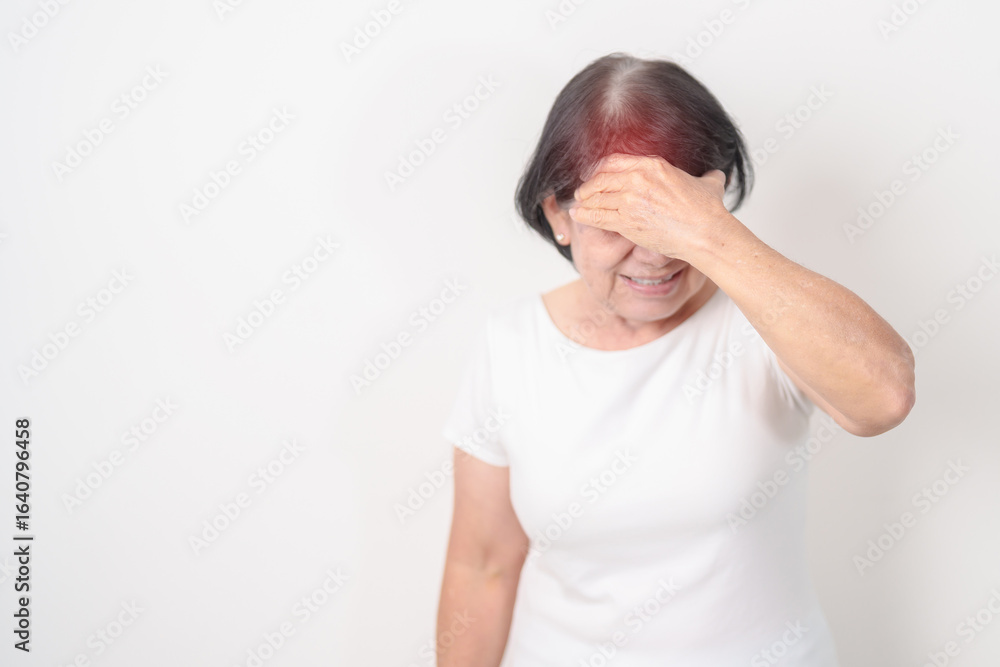 Elderly Woman having headache and Dizzy for concepts of Chronic Stress, Headache and Migraine, World Brain Tumor day, Brain Cancer, Brain Stroke, Dementia, alzheimer, Hypotension and mental health Elderly Woman having headache and Dizzy for concepts of Chronic Stress, Headache and Migraine, World Brain Tumor day, Brain Cancer, Brain Stroke, Dementia, alzheimer, Hypotension and mental health