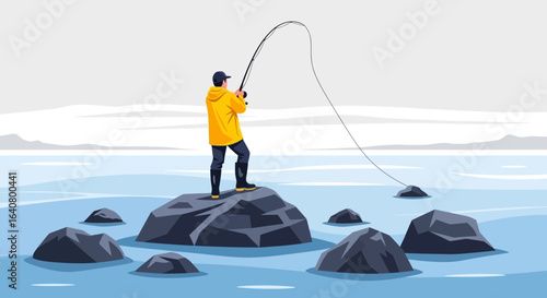 Man Fishing on Rocks in the Sea Enjoying Outdoor Pursuit Angling