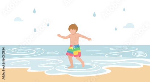 Joyful Boy Plays at the Beach with Rainbow Shorts During a Rain Shower