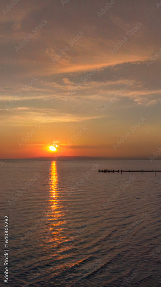 Obraz premium Sunset Tyrrhenian Sea, Viareggio, Italy. Landscape View from above.