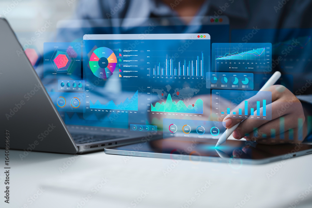 Obraz premium An Analyst uses a computer and dashboard for data business analysis and Data Management System with KPI to report. Database for technology finance, operations, sales, marketing and SEO