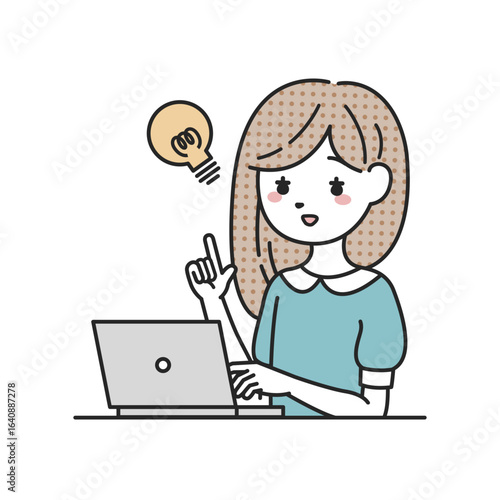 パソコンの前でひらめく女性