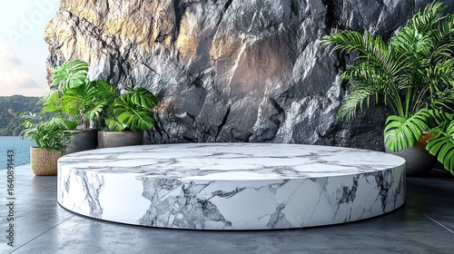 Marble podium on patio with rock backdrop and plants, ocean view beyond