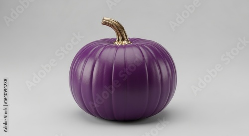 Purple pumpkin with a golden stem on a neutral background, autumn harvest season