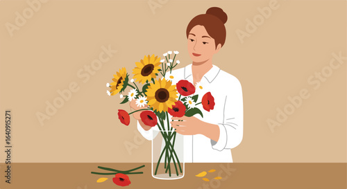 Arranging flowers.
Description Young woman arranges sunflowers, red poppies, and white daisies in a vase on a table