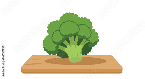 Green broccoli on wooden cutting board, preparation for cooking. Minimal