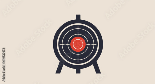 Target practice backdrop. Red bullseye in center, on stand. Black rings around center