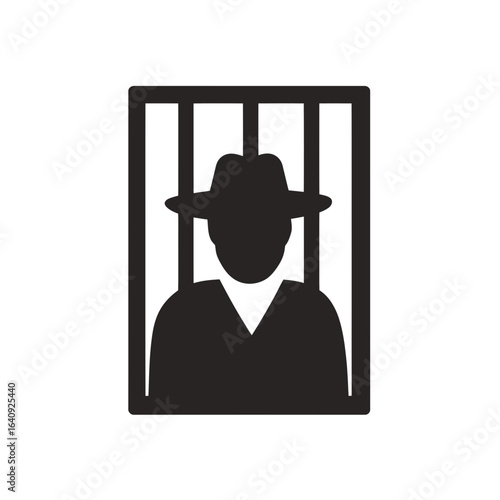 Silhouette of a man in a hat behind bars, conveying confinement and justice. Concept for legal representation, criminal justice reform and law enforcement imagery