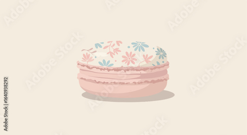 Pink macaron with floral design on top on a plain background, soft shadows
