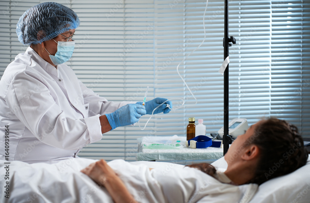 Naklejka premium Medical procedure with IV drip in clinic