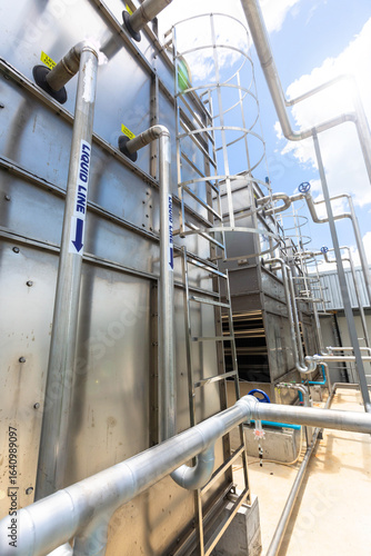 Sets of cooling towers in data center building.