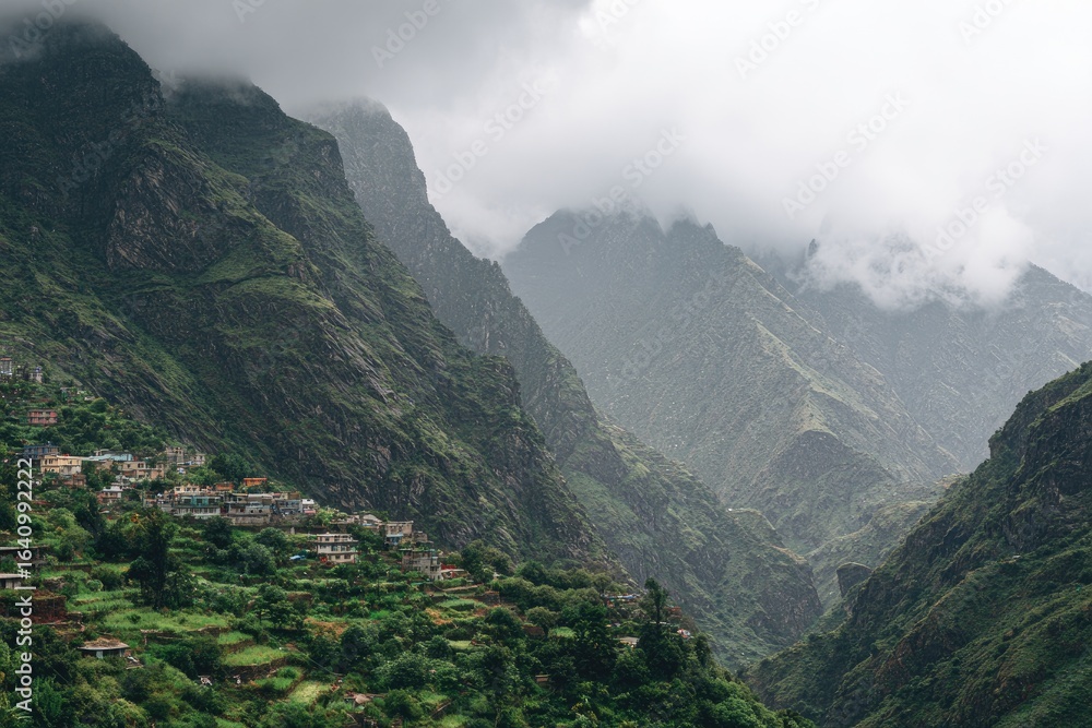 Naklejka premium Cloudy Mountainside Vista