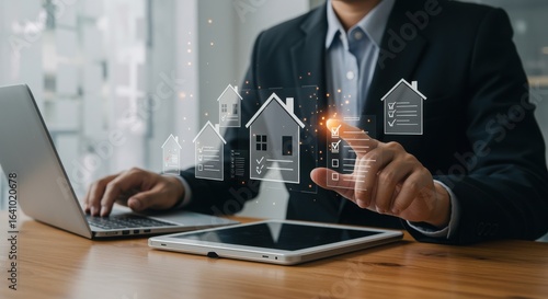 Businessman using digital tablet for real estate investment and property management online with house icon and checklist for digital transformation in business strategy