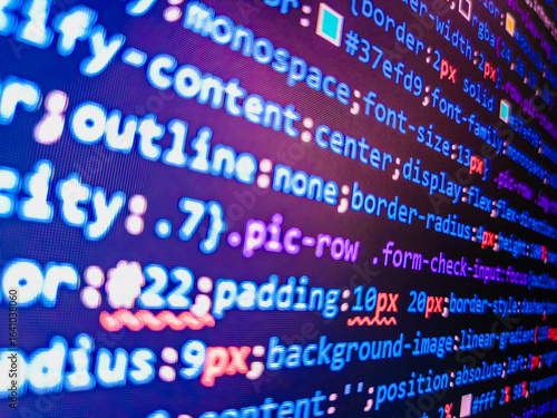 Plakat w ramie Focus point on the decrypted word. Blue background color, white text chars and digits. Concept for cyber security. Internet concept, javascript code. React HTML, native concept on LCD