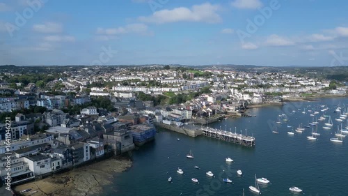 Wallpaper Mural Falmouth, Cornwall, England: DRONE VIEWS: The town of Falmouth and the St Mawes ferry quay with moored yachts on the River Fal. Falmouth is a popular UK holiday destination and port town (Clip 1). Torontodigital.ca