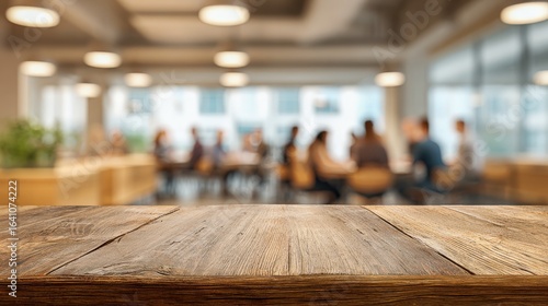 Wallpaper Mural Wooden Tabletop with Blurred Office Background Featuring Group of People in Meeting Space Torontodigital.ca