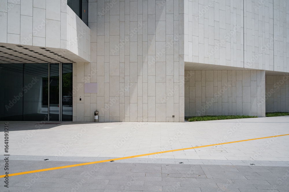 empty brick ground with modern building empty brick ground with modern building
