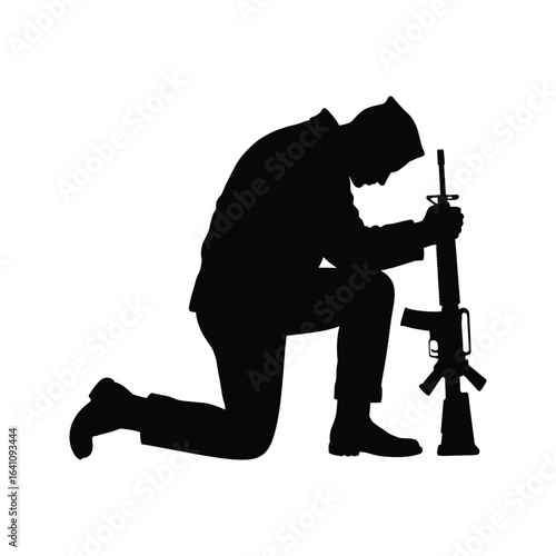 Silhouette of a kneeling soldier with rifle memorial remembrance respect veteran military prayer fallen soldier tribute patriotism grief loss army soldier veterans day