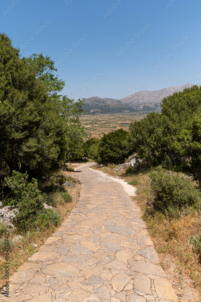 Exploring the ancient path leading to Dikteon Cave in Lasithi, Crete, Greece Exploring the ancient path leading to Dikteon Cave in Lasithi, Crete, Greece