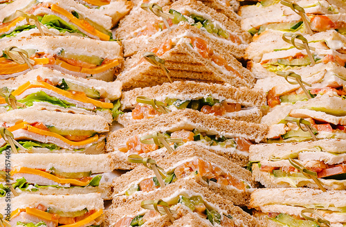 Delicious assorted sandwich platter prepared for a lunchtime gathering