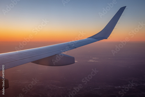 Evening view from plane window in Poland after take-off from Warsaw airport