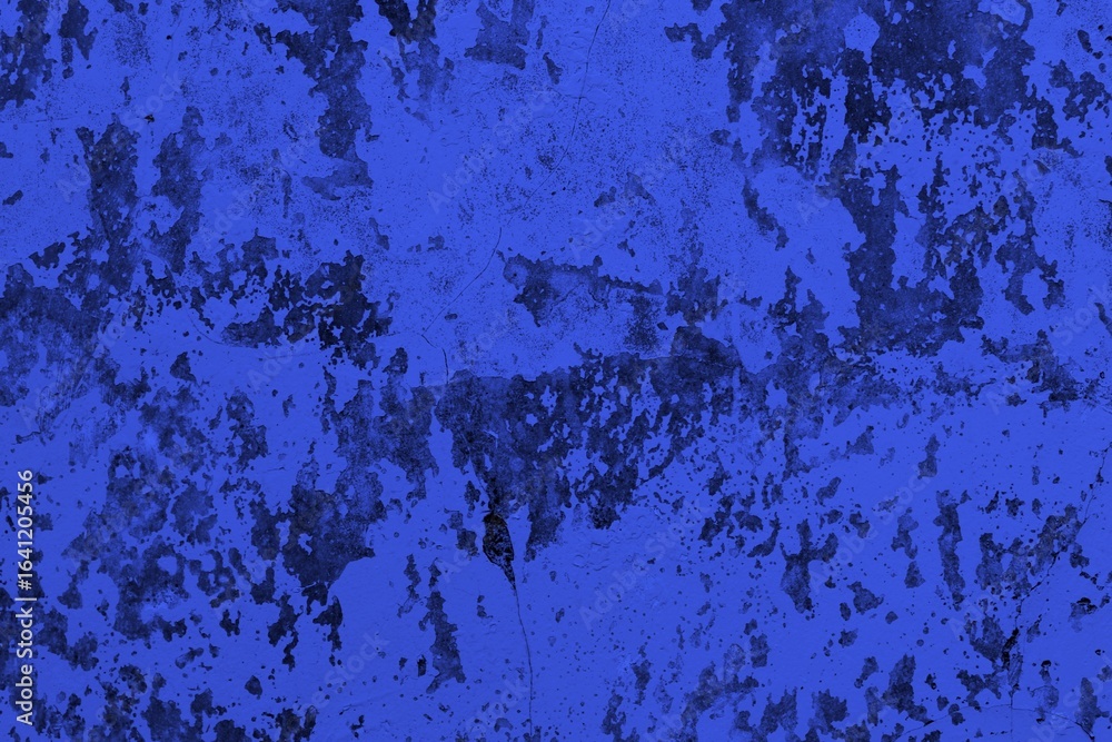 Fototapeta premium Close-up view of a blue textured wall showing rough patterns and intricate shadow details, offering a visually appealing background texture for versatile creative uses.