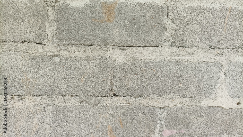 Fototapeta premium Gray wall background texture. Square photo pattern