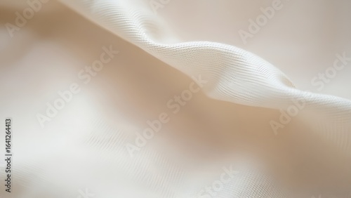 Natural linen fabric with subtle texture, showcasing minimalist elegance in neutral tones.