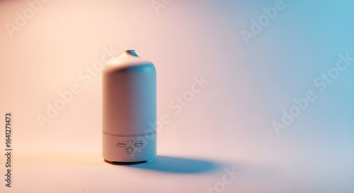 Minimalist white ultrasonic essential oil diffuser with LED controls on a gradient background