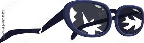 Broken sunglasses are reflecting light, creating an abstract pattern on the lenses