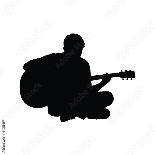 Silhouette of a person playing an acoustic guitar, sitting crosslegged, isolated on white background
